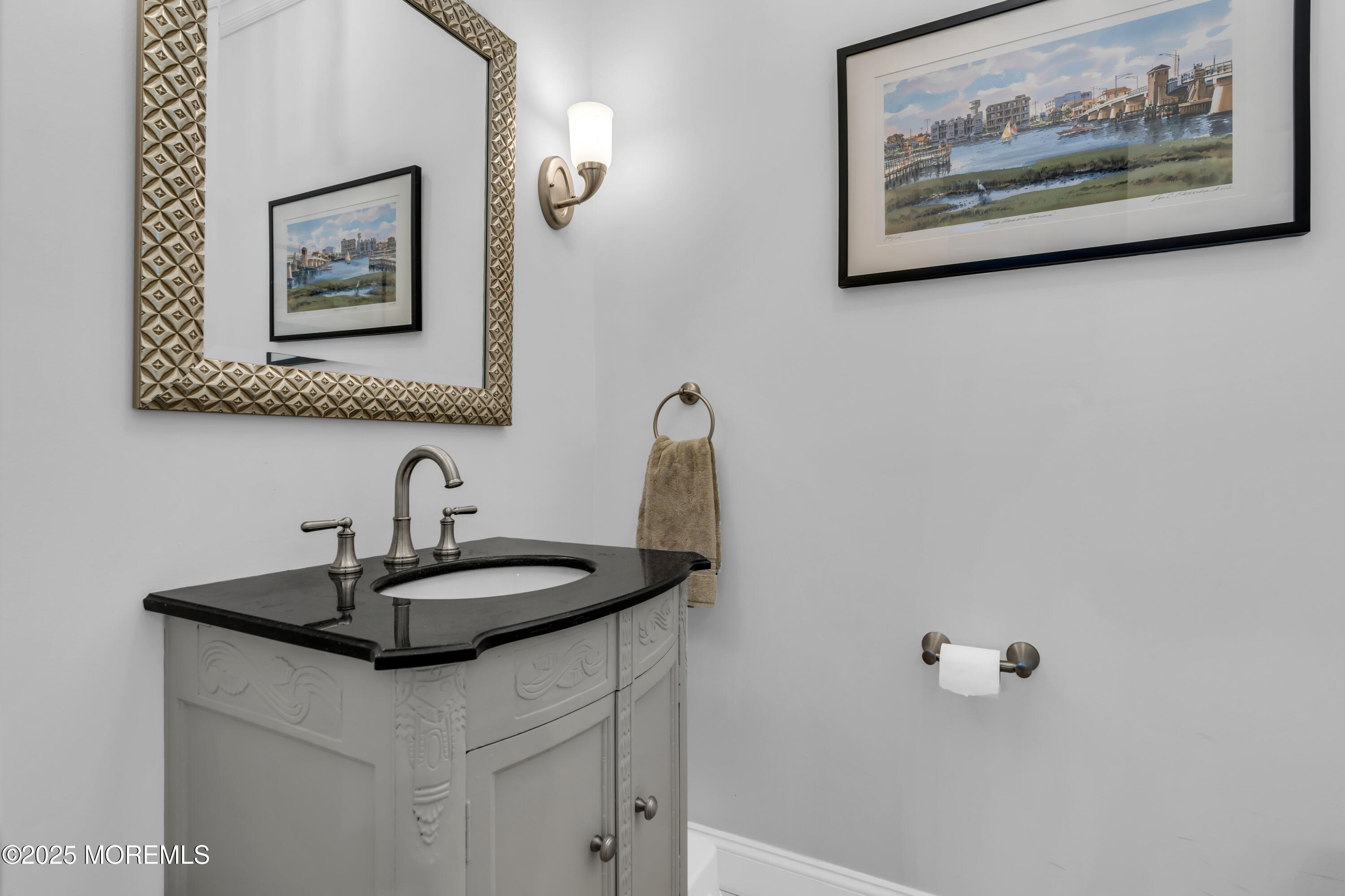 12 Forrest Avenue Rumson, NJ 07760 - Photo 44 of 55 a bathroom with a sink and a mirror