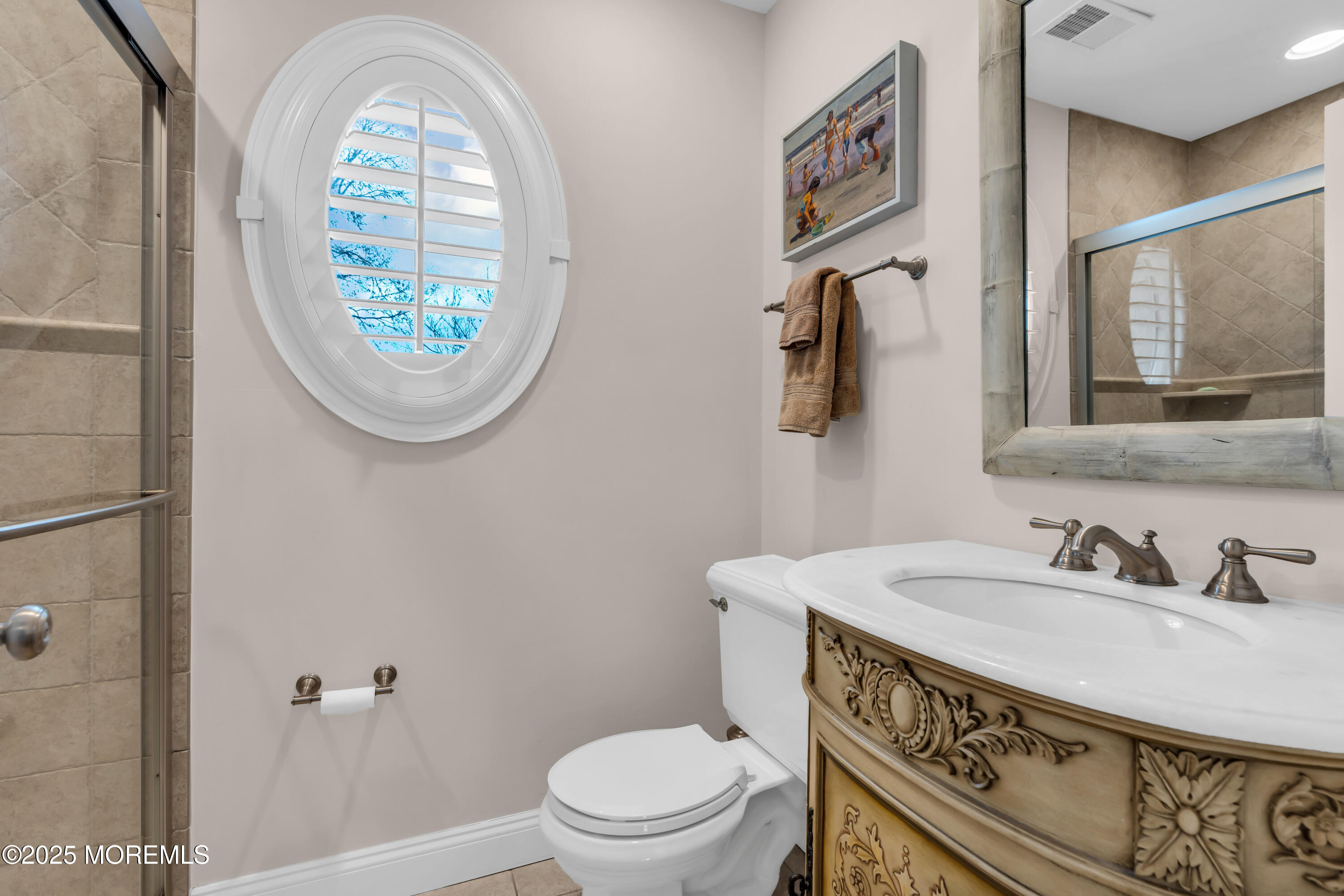12 Forrest Avenue Rumson, NJ 07760 - Photo 5 of 55 a bathroom with a toilet a sink and mirror