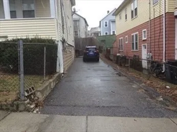 a view of a small yard in front of a house
