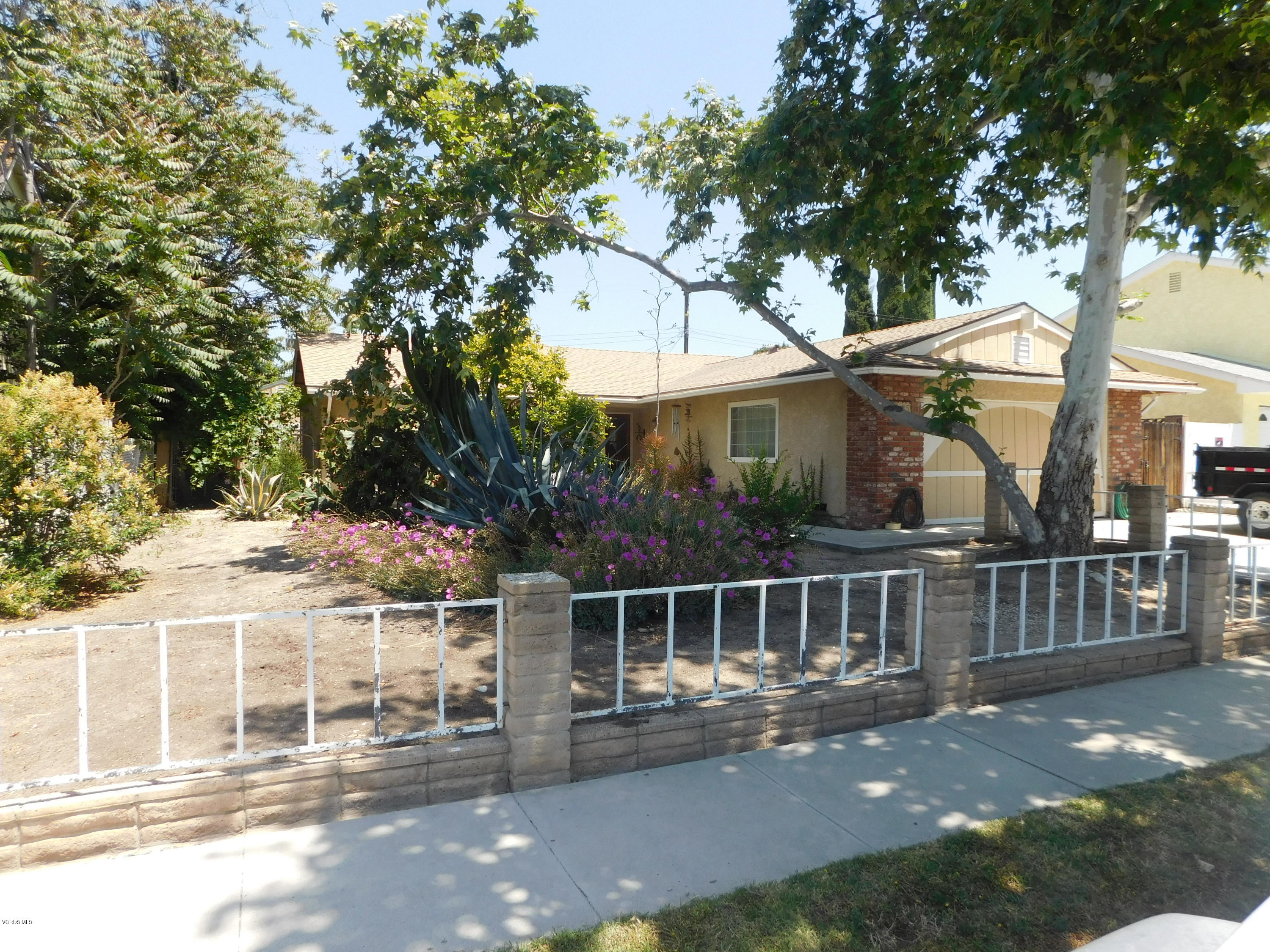 2105 Rhoda Street Simi Valley, CA 93065 - Photo 1 of 15 a view of a house with a yard