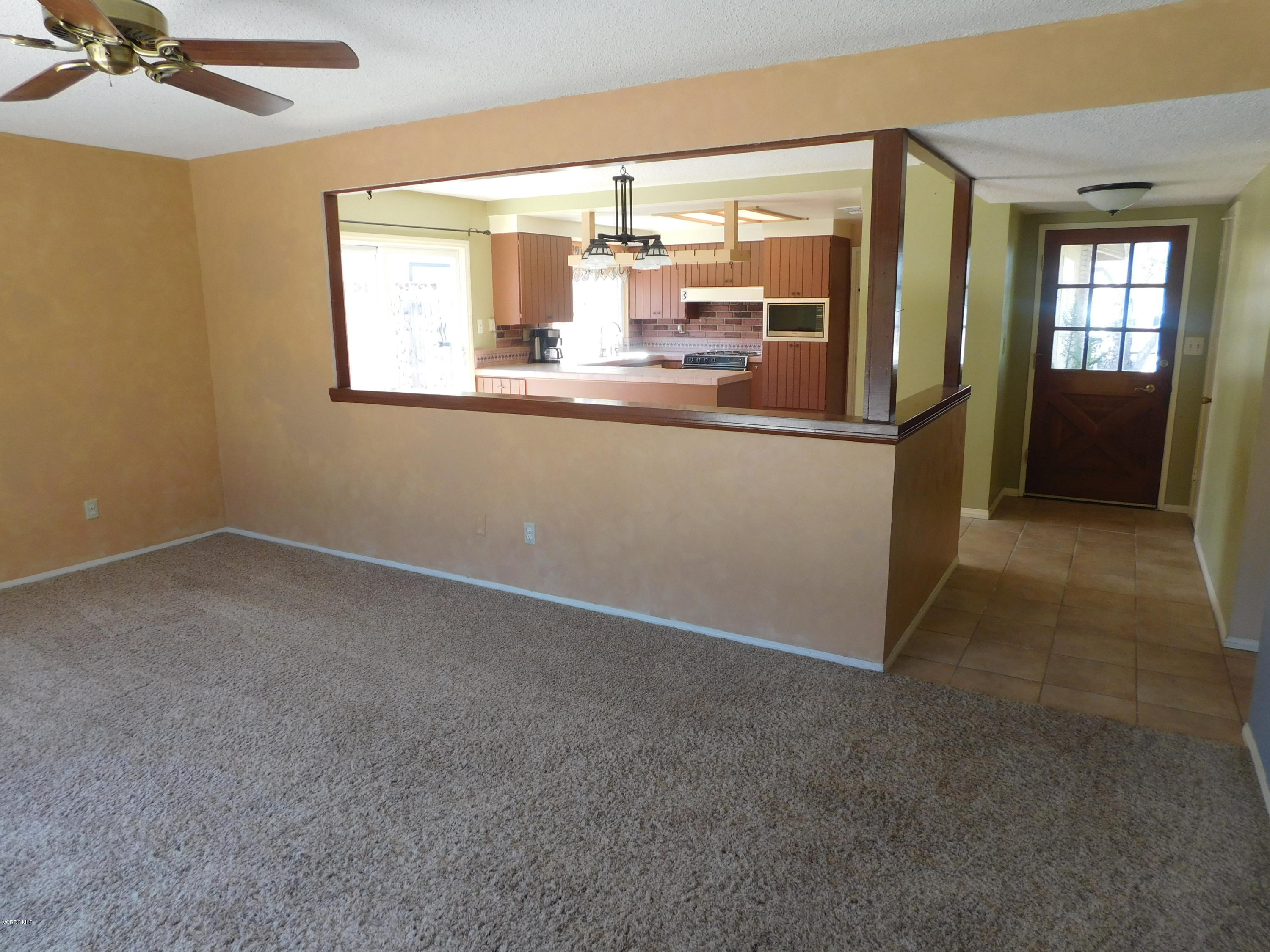 2105 Rhoda Street Simi Valley, CA 93065 - Photo 4 of 15 a view of a kitchen with a sink and window