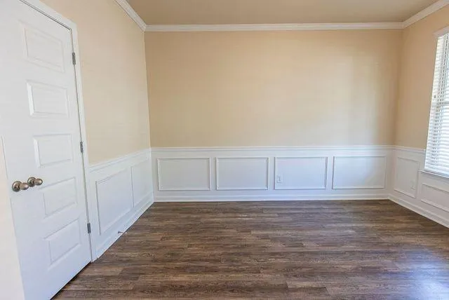 a view of an empty room and window