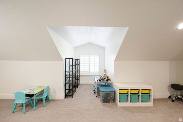 924 Country Lane Farmington, UT 84025 - Photo 44 of 91 Bright attic space featuring a dormer window with louvered shutters, sloped ceilings, recessed lighting, and neutral carpeting