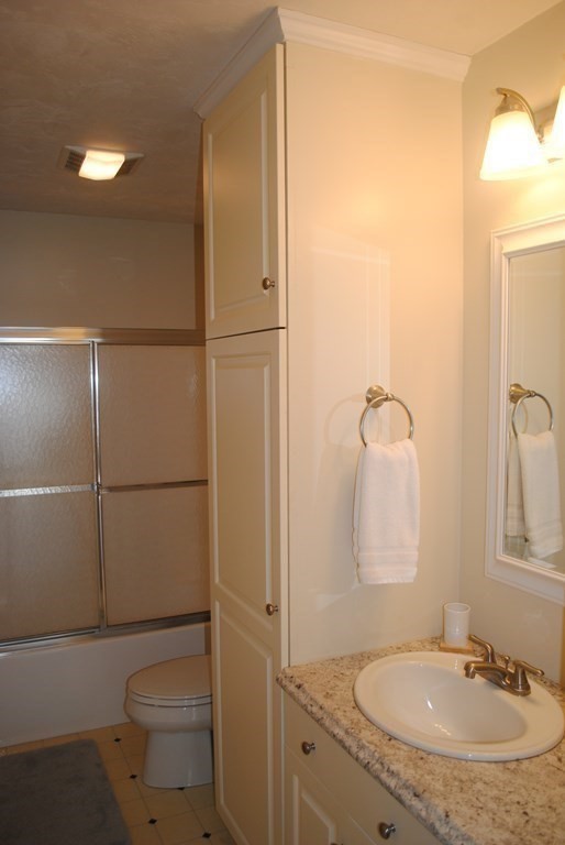 518 Douglas Road Northbridge, MA 01588 - Photo 20 of 41 a bathroom with a sink toilet and shower