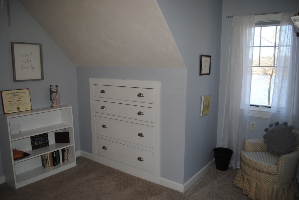 518 Douglas Road Northbridge, MA 01588 - Photo 26 of 41 a living room with furniture and a window