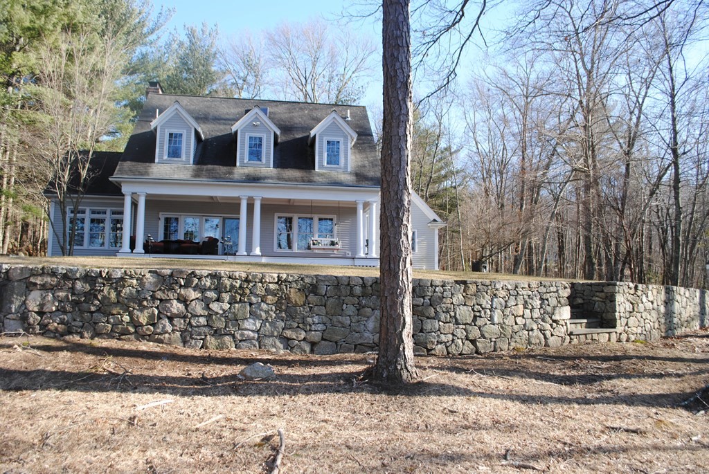 518 Douglas Road Northbridge, MA 01588 - Photo 3 of 41 a front view of a house with a garden