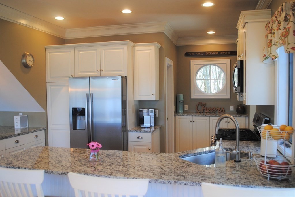518 Douglas Road Northbridge, MA 01588 - Photo 7 of 41 a kitchen with refrigerator and sink