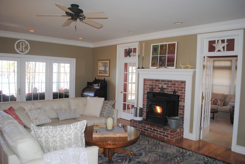 518 Douglas Road Northbridge, MA 01588 - Photo 8 of 41 a living room with furniture and a fireplace