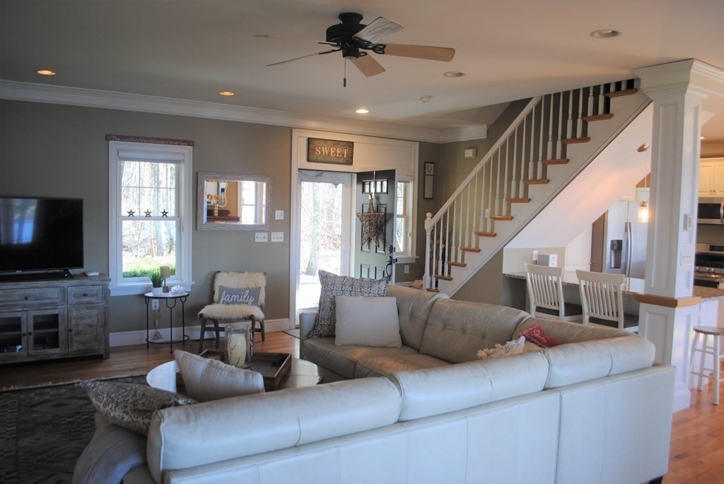 518 Douglas Road Northbridge, MA 01588 - Photo 10 of 41 a living room with furniture and a flat screen tv
