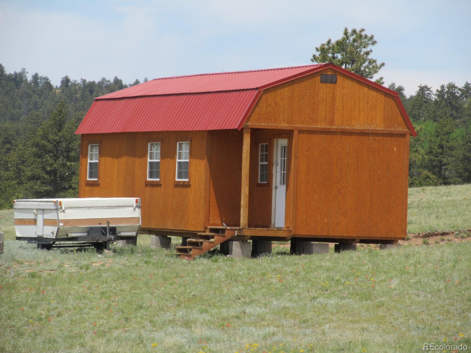 1035 Jefferson Road Hartsel, CO 80449 - Photo 1 of 9 a view of backyard of house