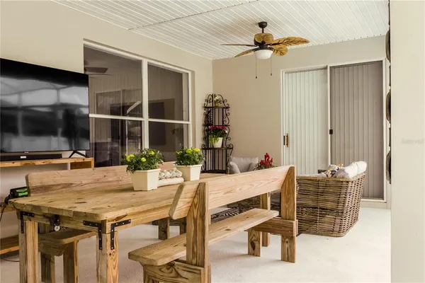 a dinning table and chairs in a room