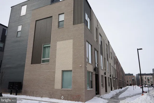 a view of a building along the street