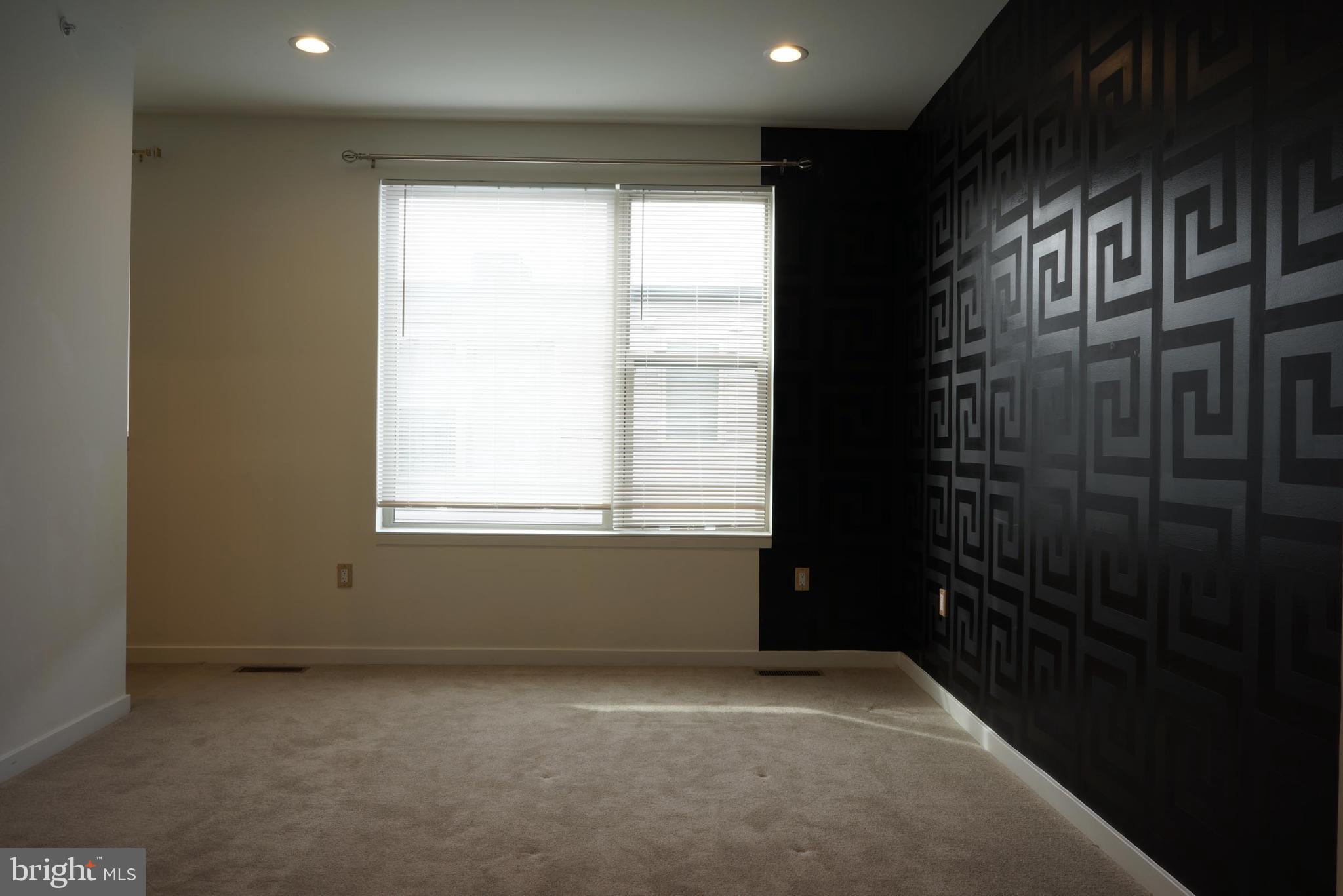 3130 Pierview Lane Philadelphia, PA 19125 - Photo 19 of 26 a view of an empty room with a window