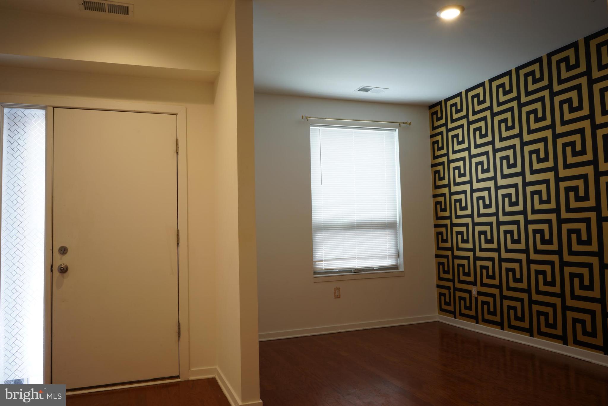 3130 Pierview Lane Philadelphia, PA 19125 - Photo 3 of 26 a view of an empty room with a window