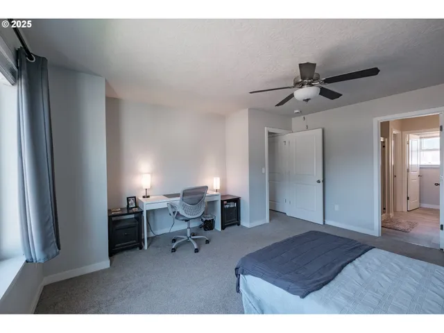 a bathroom with a sink double vanity granite and a mirror