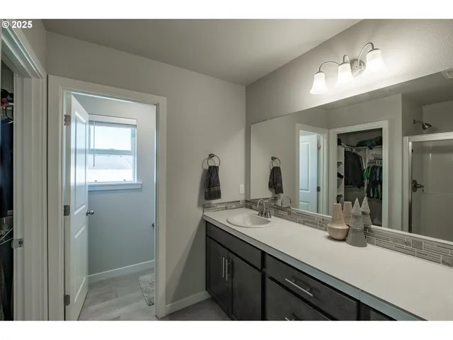 a view of backyard with a patio