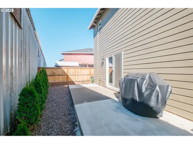 a view of a backyard with trees