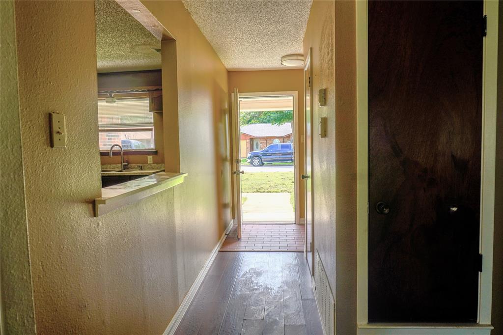 300 Coury Road Everman, TX 76140 - Photo 11 of 29 a view of a glass door