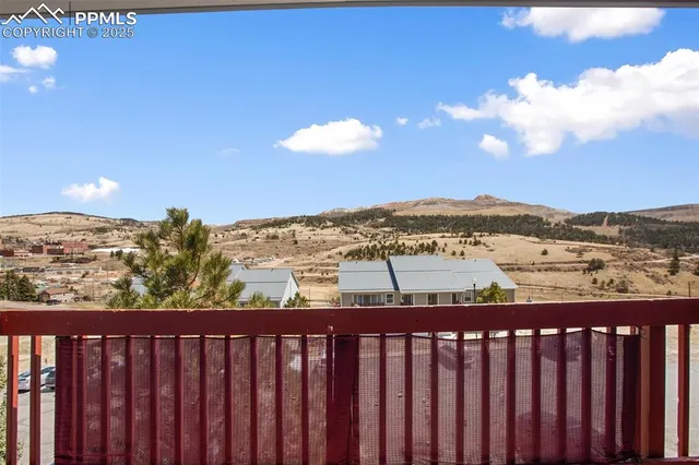 a view of city from a balcony
