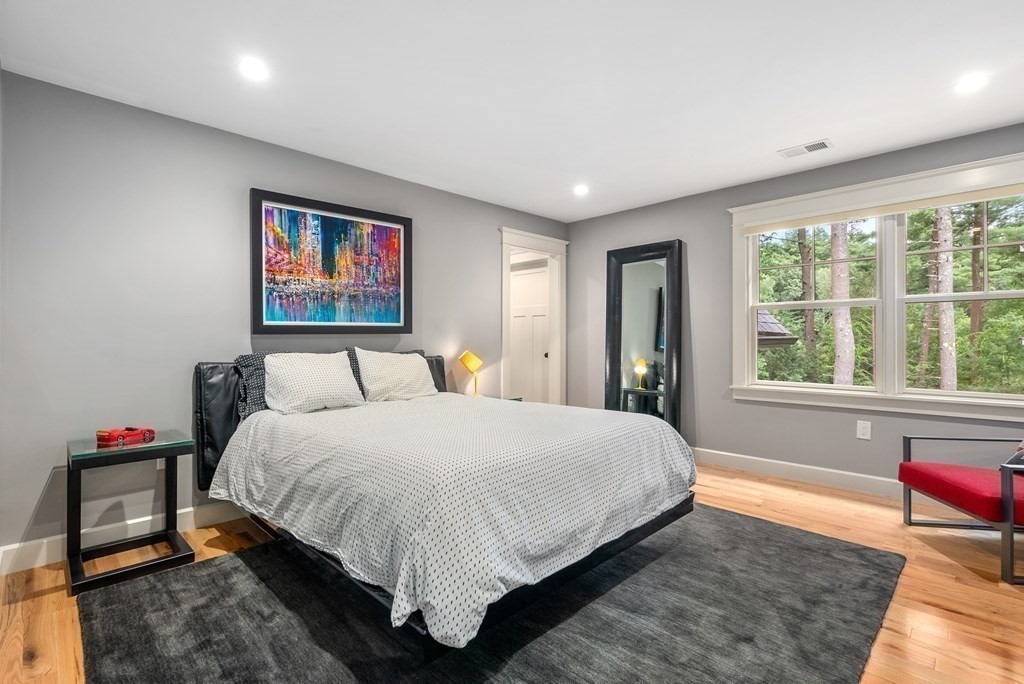 103 Conant Road Weston, MA 02493 - Photo 28 of 42 a bedroom with bed and a window