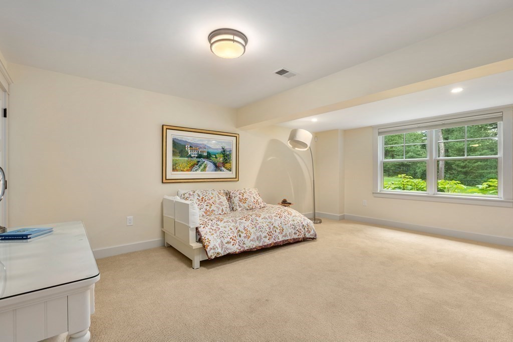 103 Conant Road Weston, MA 02493 - Photo 34 of 42 a bedroom with a bed and a window