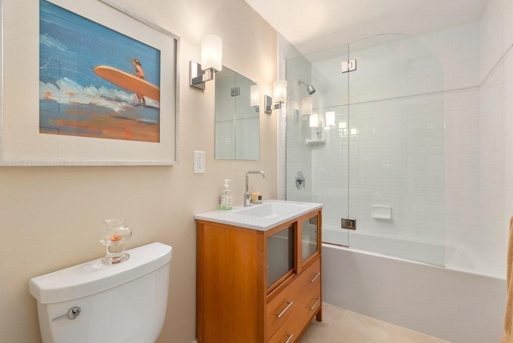 103 Conant Road Weston, MA 02493 - Photo 35 of 42 a bathroom with a sink a toilet and a bathtub