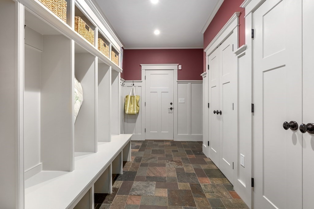 103 Conant Road Weston, MA 02493 - Photo 36 of 42 a bathroom with a mirror and a shower