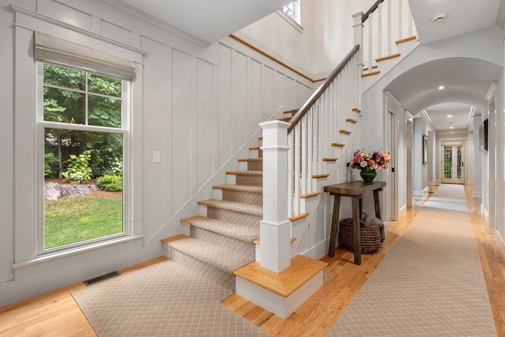 103 Conant Road Weston, MA 02493 - Photo 4 of 42 a view of entryway and hall with wooden floor