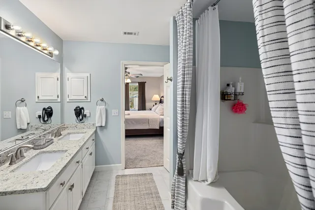 a view of a chandelier fan in a room