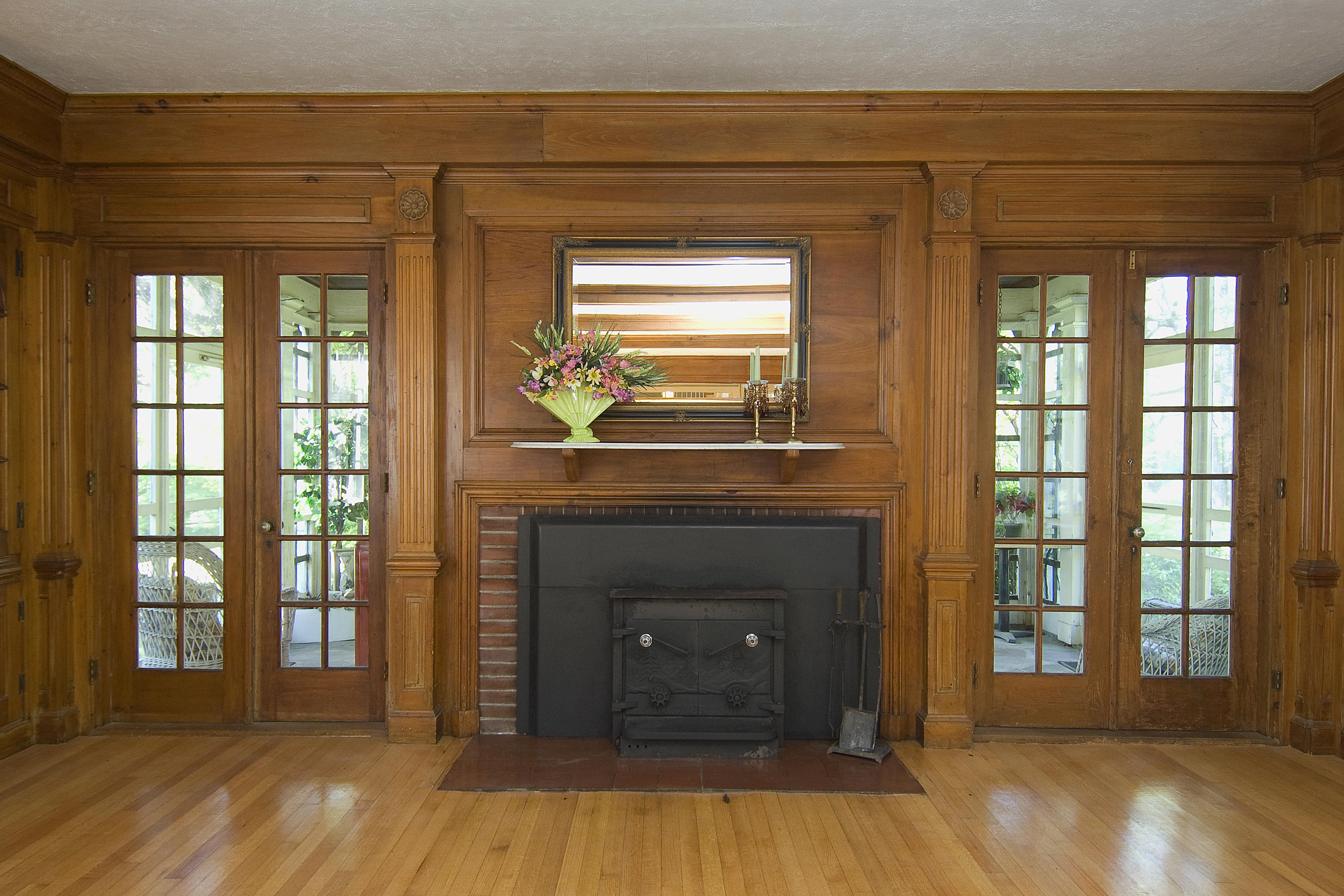 68 Beach Road Madison, ME 04950 - Photo 14 of 43 dining room woodstove & sunroom beyond