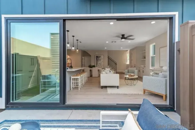a view of living room with furniture and a window