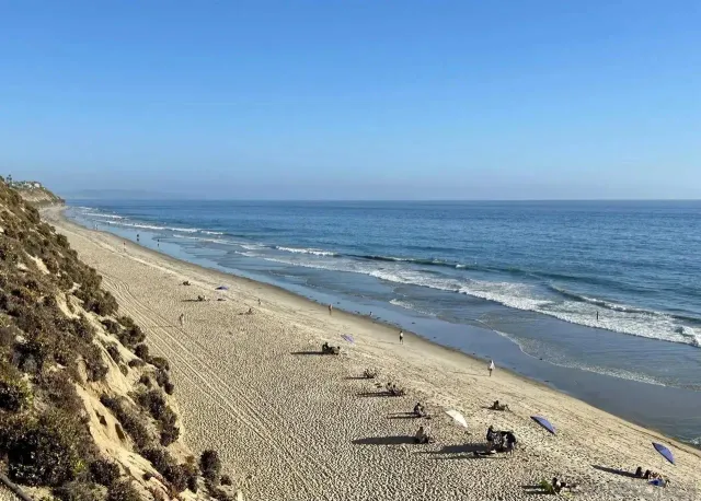 a view of beach and ocean