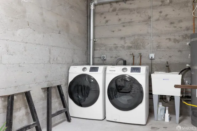 a utility room with dryer and washer