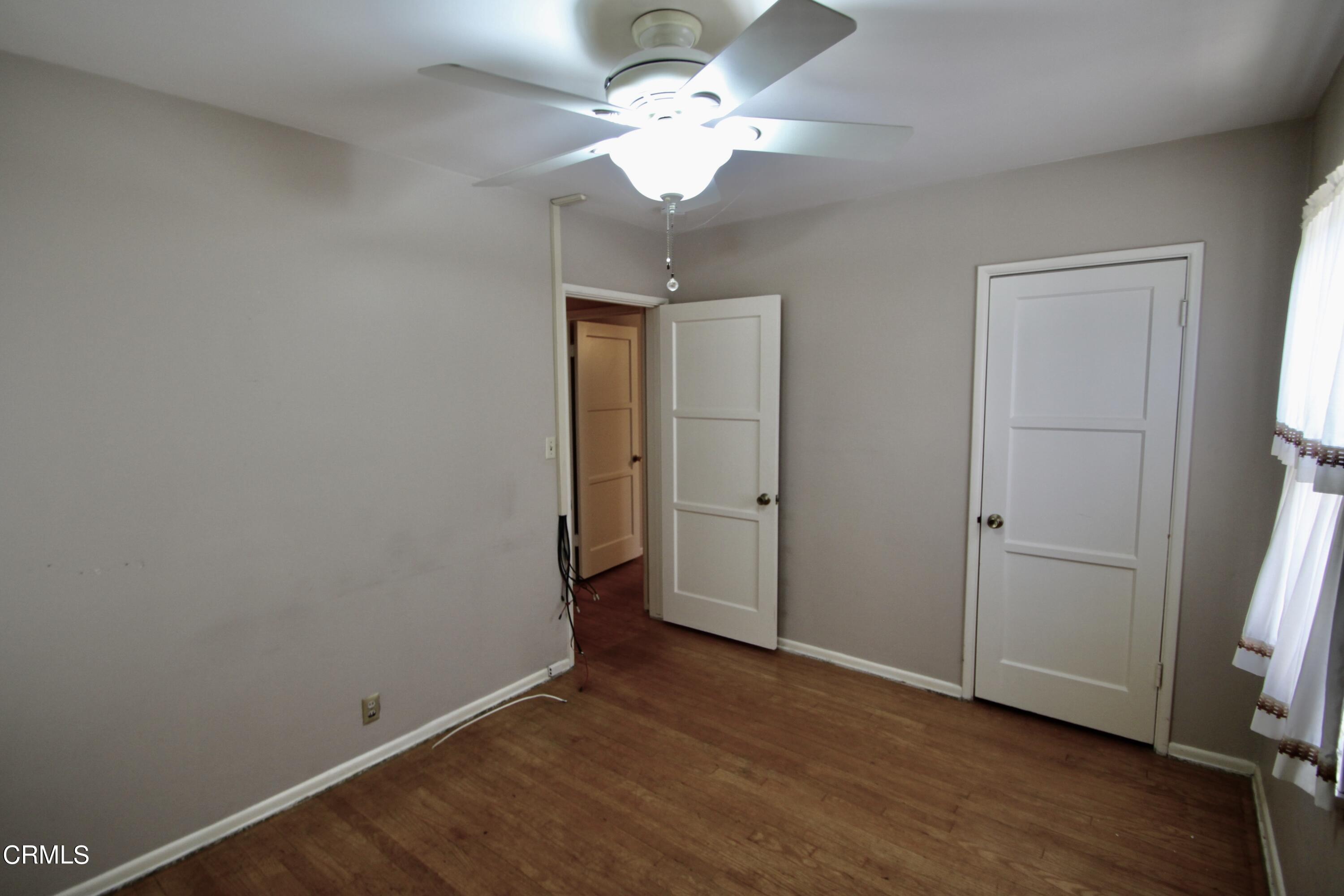 310 Santa Rosa Road Arcadia, CA 91007 - Photo 17 of 21 wooden floor in an empty room with a window