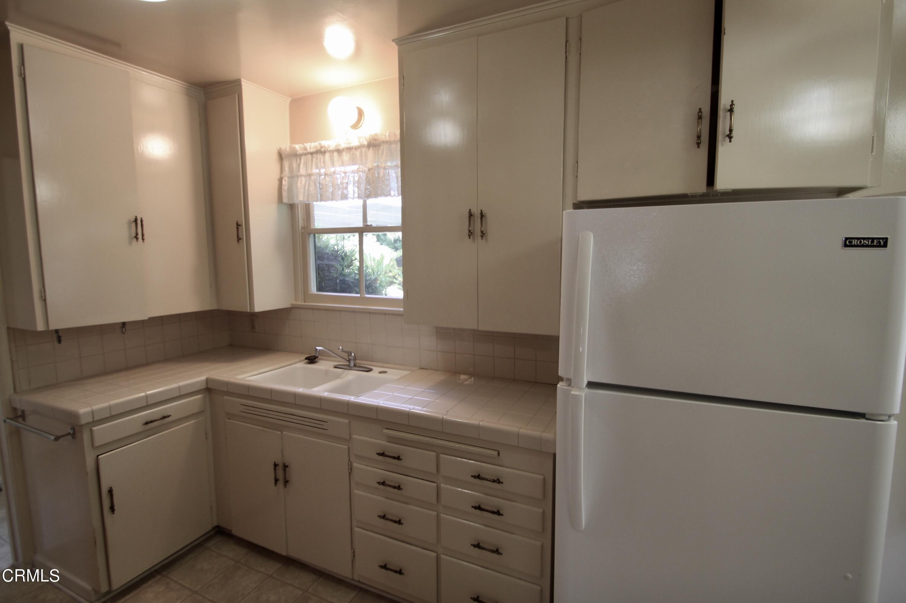 310 Santa Rosa Road Arcadia, CA 91007 - Photo 7 of 21 a bathroom with a sink and mirror