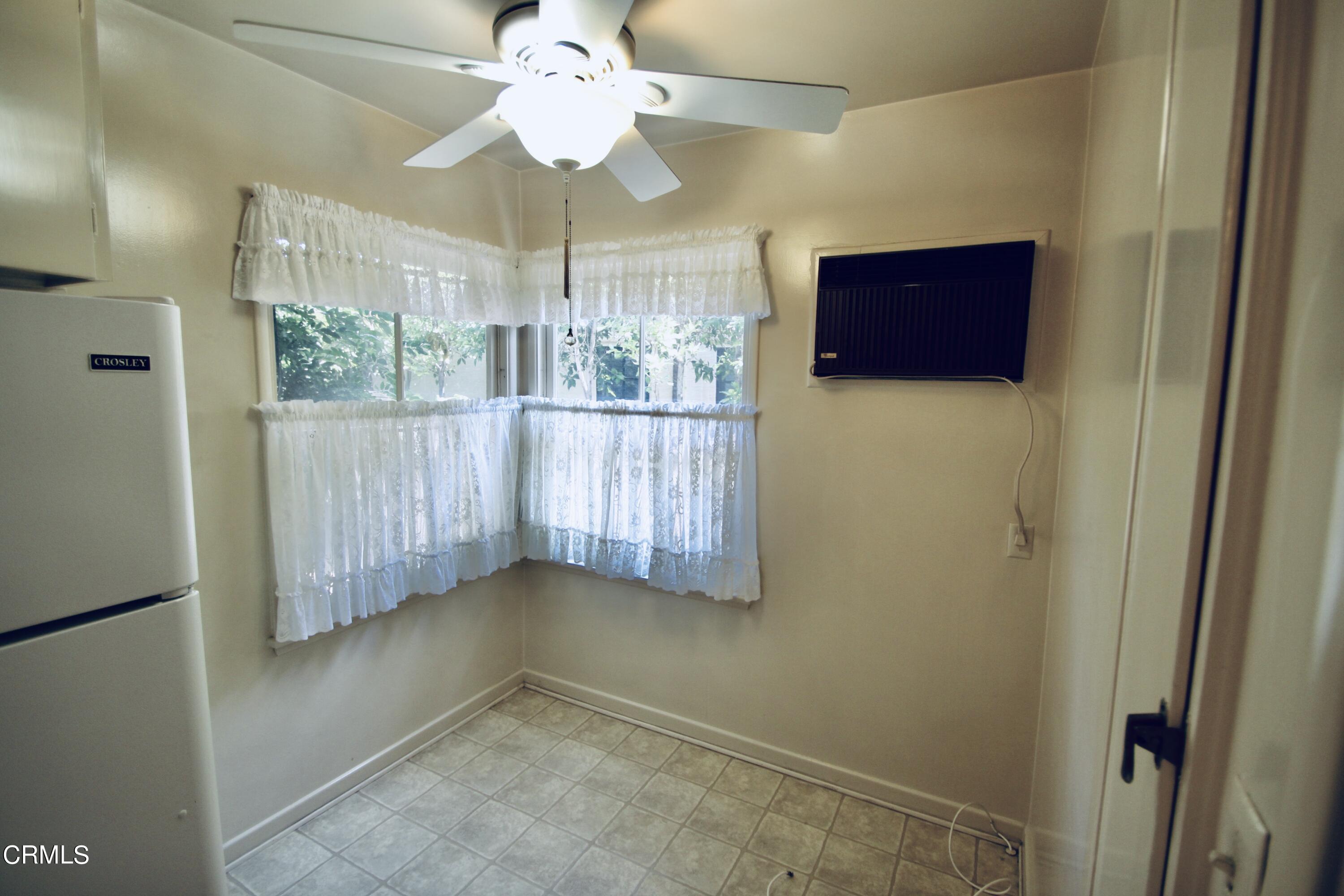 310 Santa Rosa Road Arcadia, CA 91007 - Photo 8 of 21 a view of a hallway with a chandelier