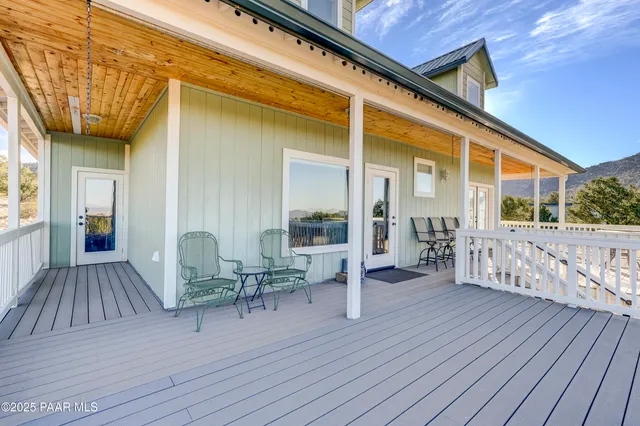 a view of living room with wooden floor