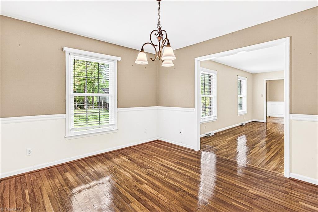 3903 Oakcliffe Road Greensboro, NC 27406 - Photo 9 of 42 Dining room view to the living room.