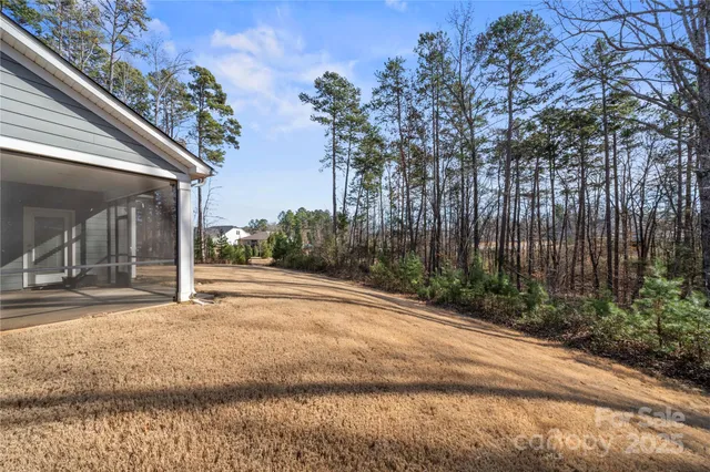 a view of a park with swings and slides
