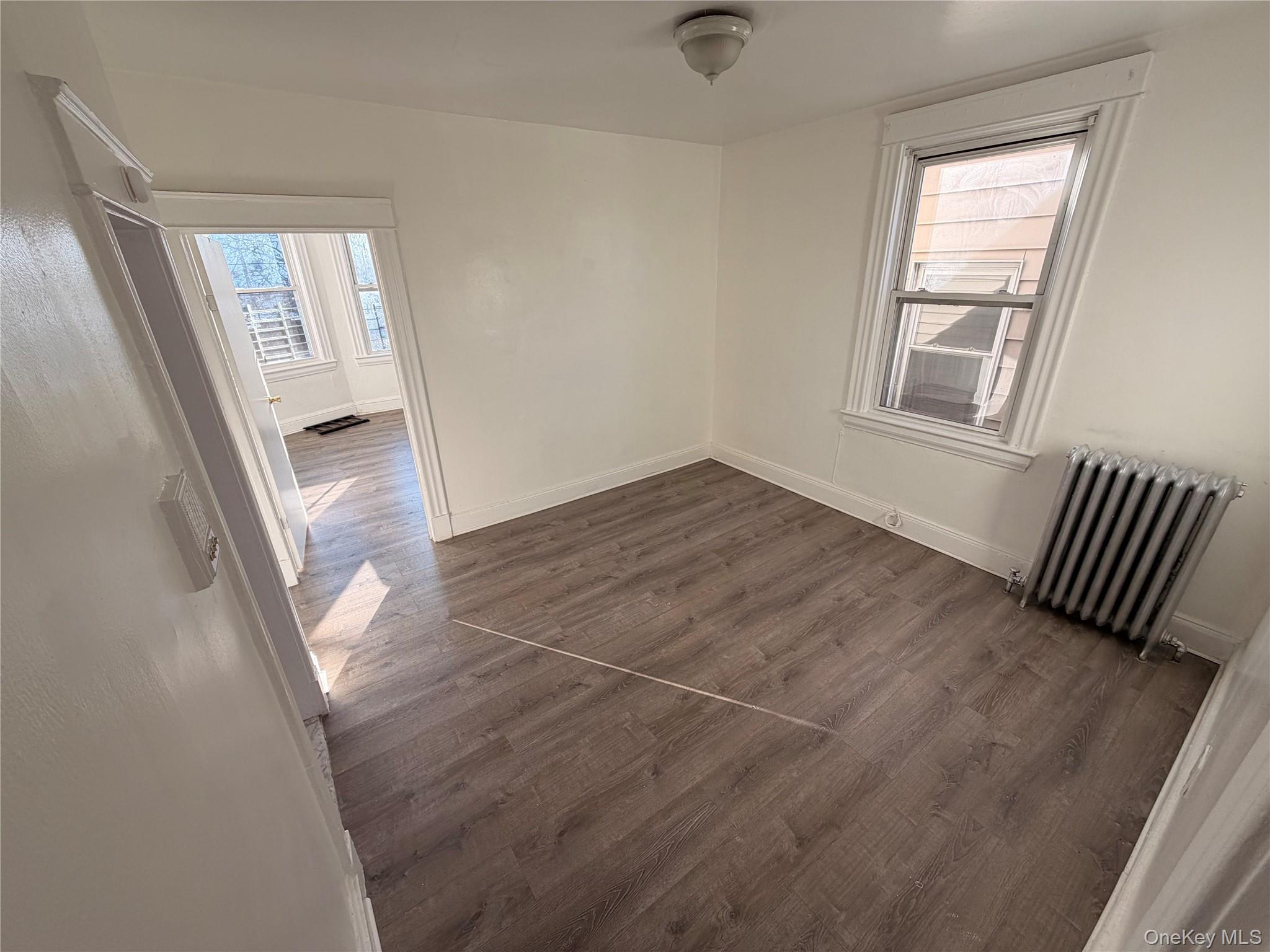 13 Cedar Street, Unit 3 Yonkers, NY 10701 - Photo 10 of 12 an empty room with windows