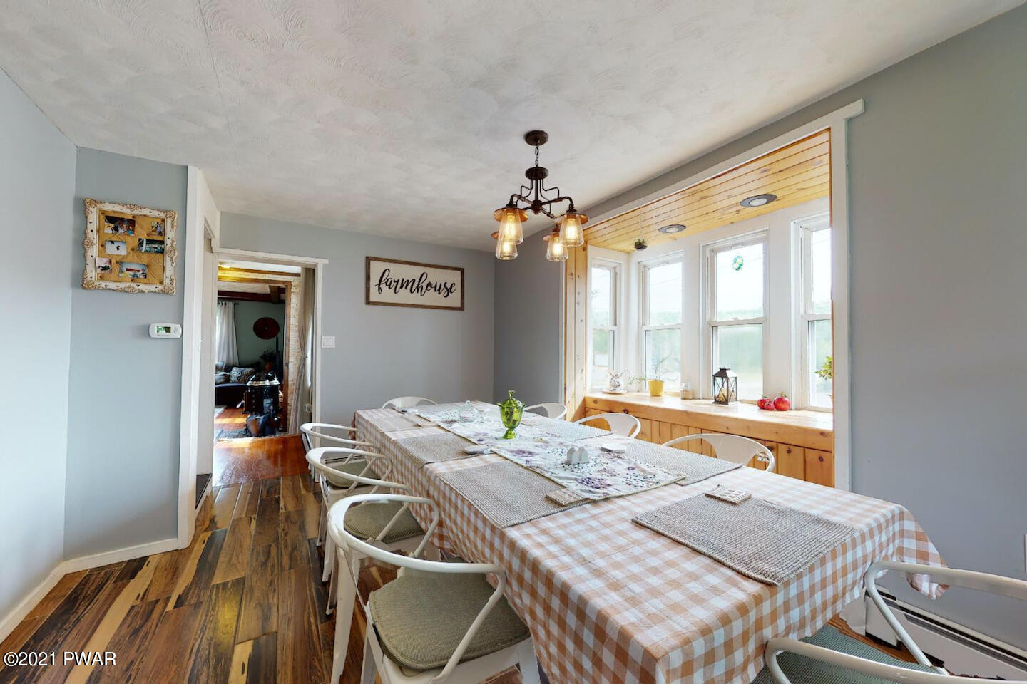 20 Pond Road Moscow, PA 18444 - Photo 31 of 59 a view of a dining room with furniture wooden floor and chandelier