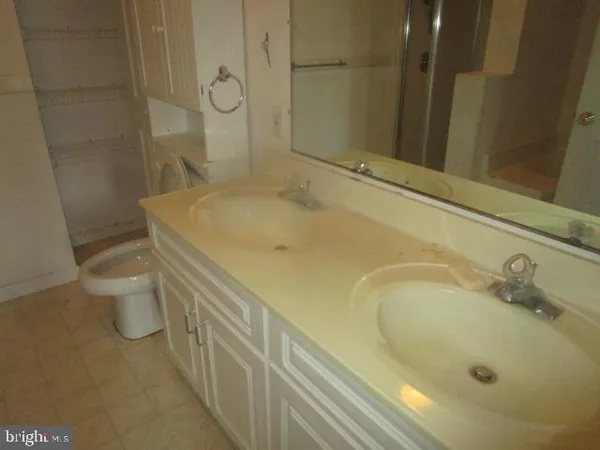 a bathroom with a sink and toilet