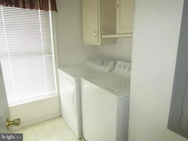 a bathroom with a sink and a shower