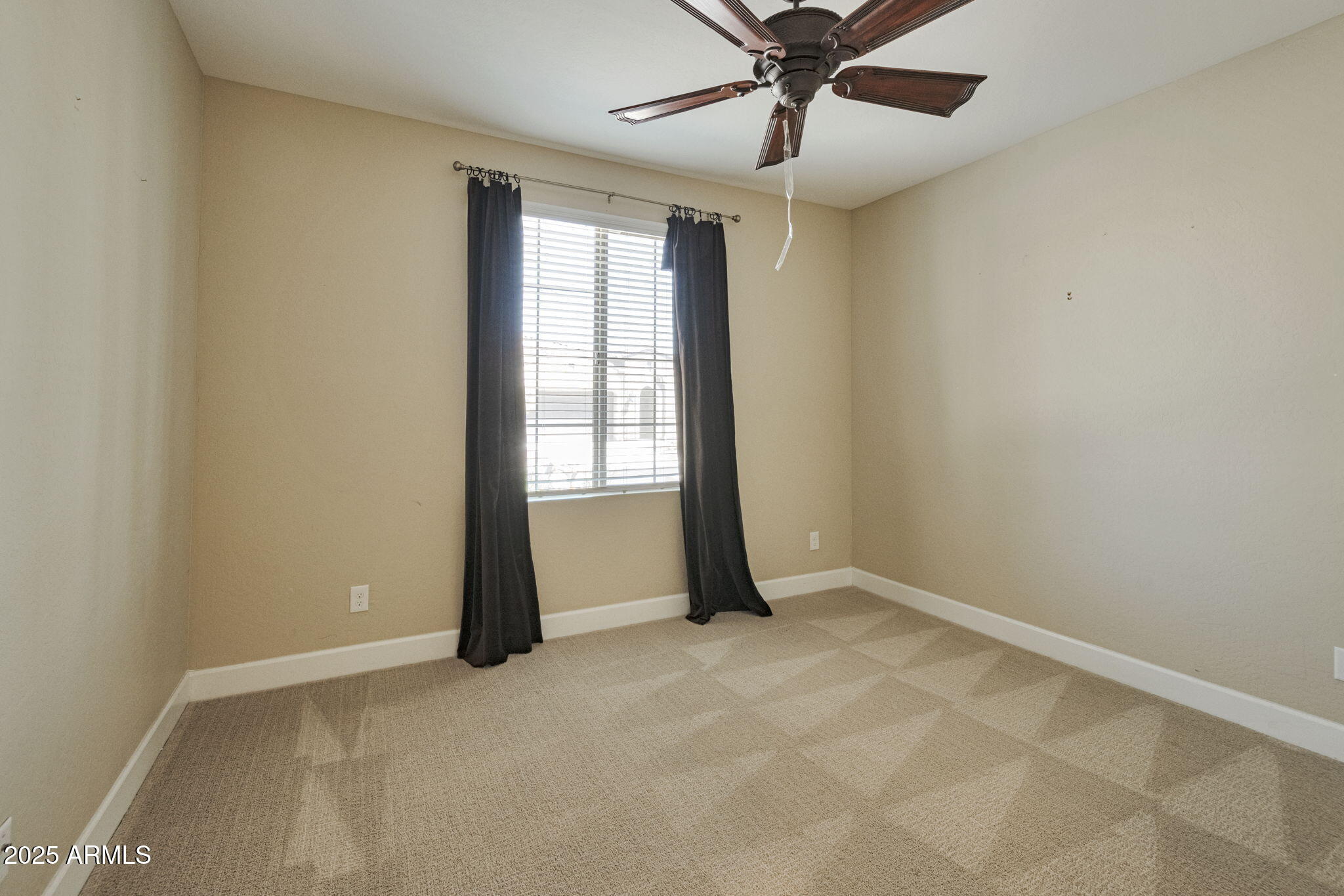 16927 West Granada Road Goodyear, AZ 85395 - Photo 16 of 25 Guest bedroom