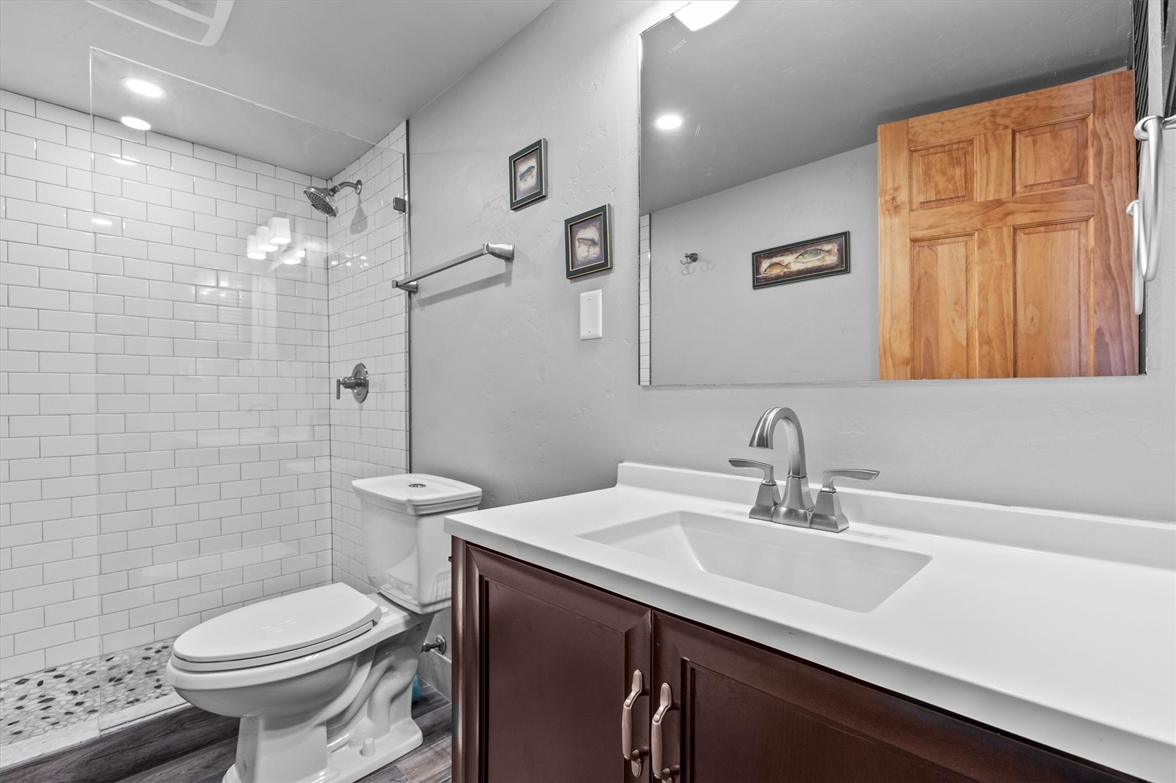 2602 Longthong Road, Unit 107 Steamboat Springs, CO 80487 - Photo 15 of 32 a bathroom with a sink toilet and shower