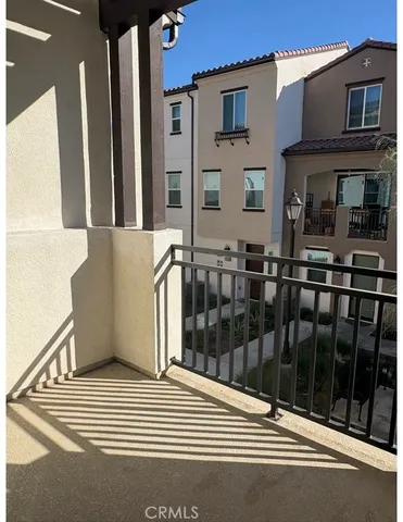 a view of a building from a balcony