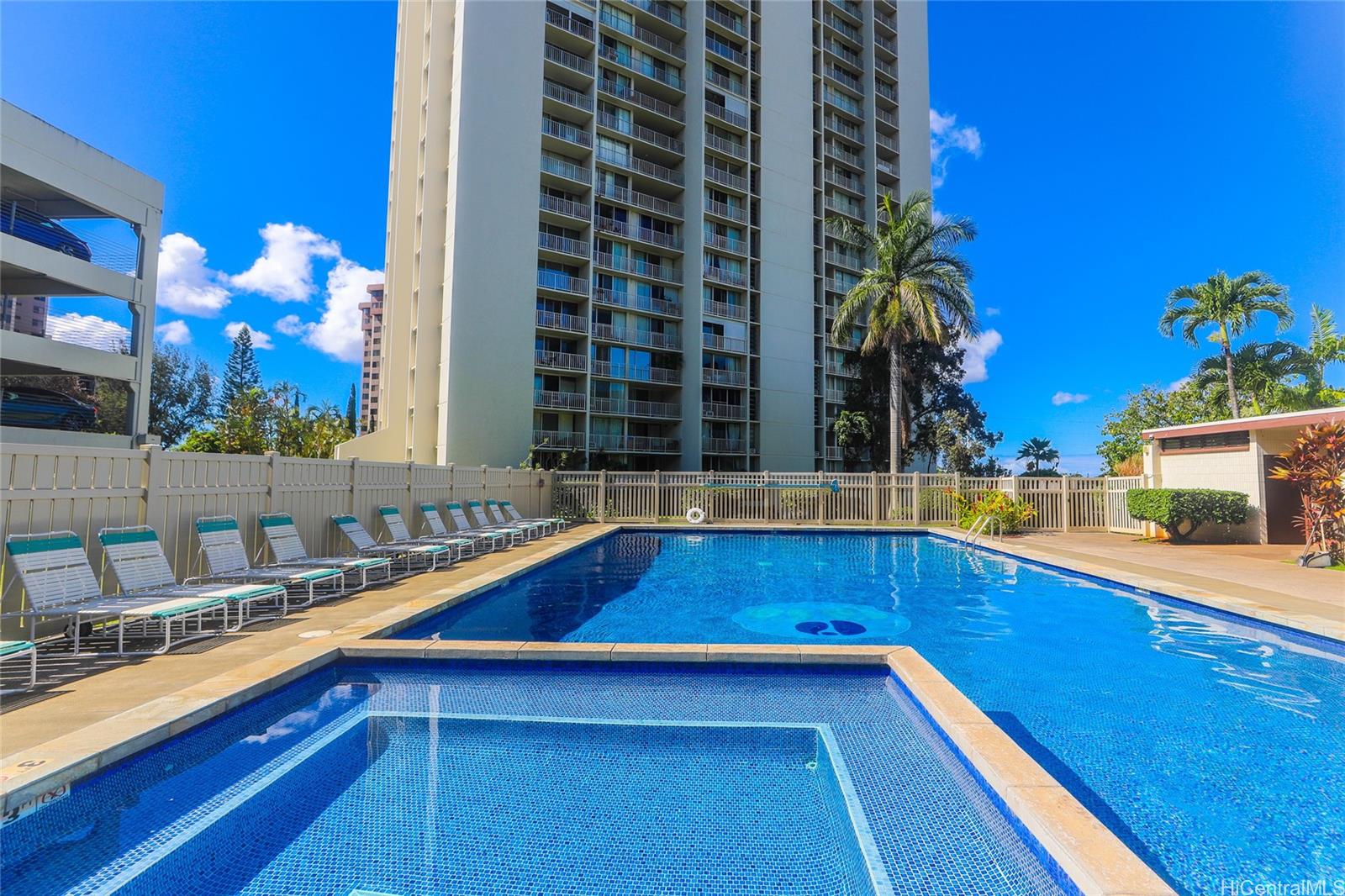 98-410 Koauka Loop, Unit 32C Aiea, HI 96701 - Photo 23 of 25 a view of swimming pool with outdoor seating