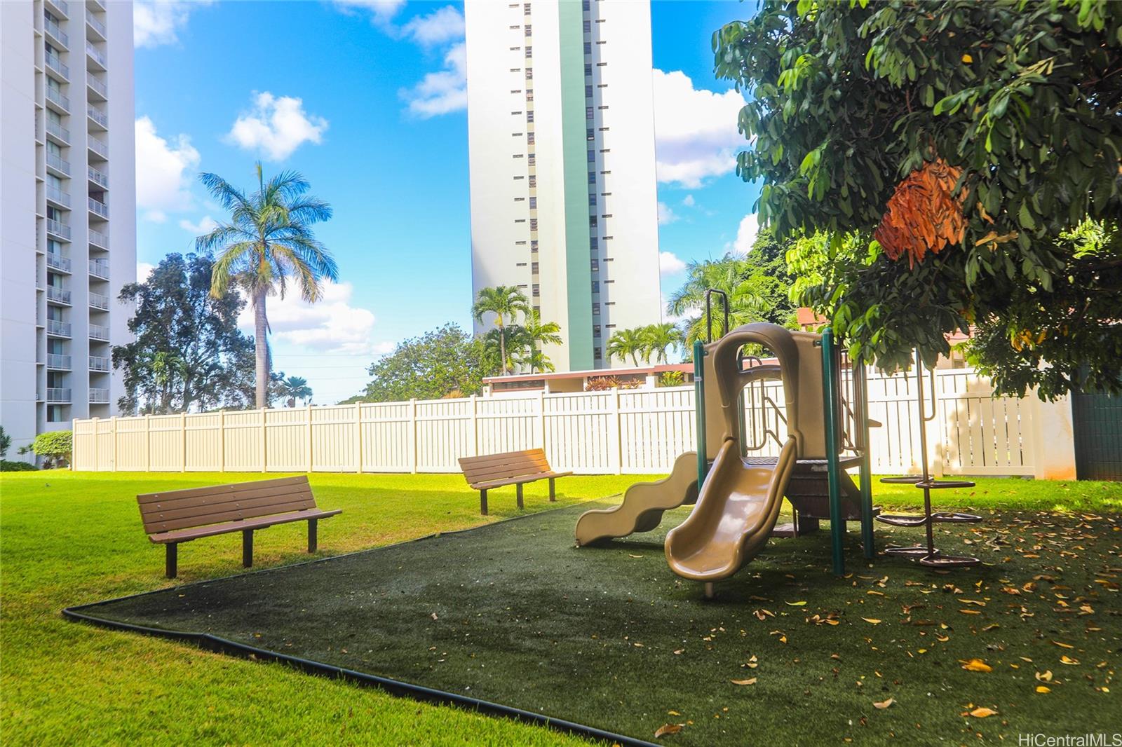 98-410 Koauka Loop, Unit 32C Aiea, HI 96701 - Photo 25 of 25 a swimming pool with outdoor seating and yard