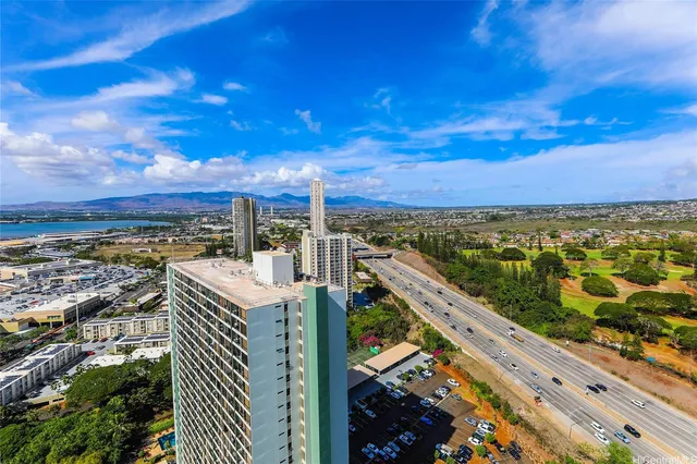 a view of a city with an ocean view