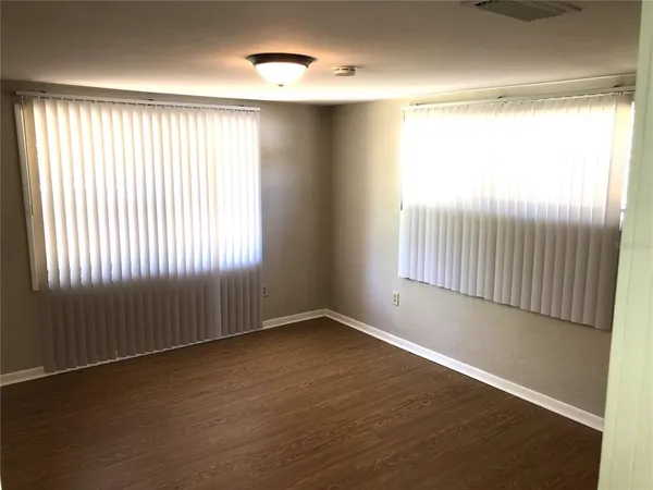 an empty room with windows